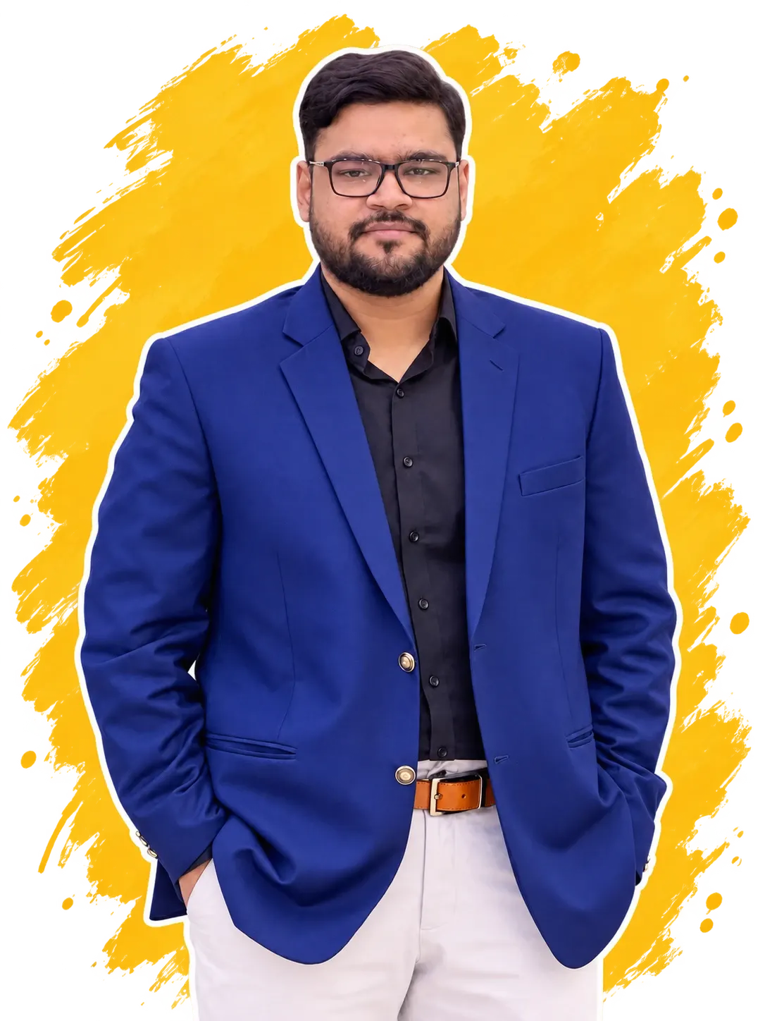 Muhammad Ishmal in a cobalt-blue blazer, black shirt and glasses, hands in pockets, in front of a yellow paint splash